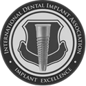 internationa--dental-implan--association International Dental Implant Association logo symbolizing implant excellence and professional dental implant certification.